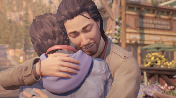 Screenshot of Gabe and Alex Chen hugging just after Alex arrives in Haven Springs