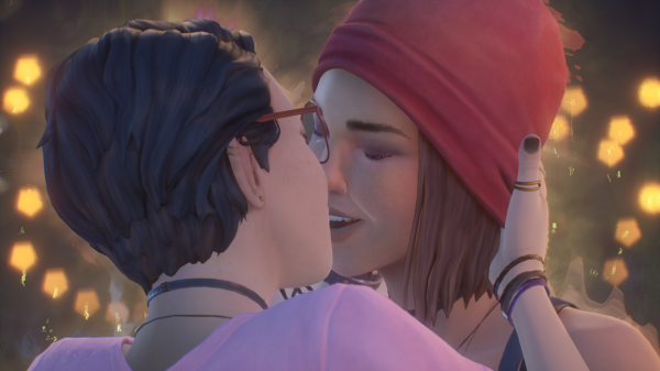 Screenshot of Alex Chen and Steph Gingrich kissing. Steph is wearing a red beanie and is smiling. Alex is wearing a light pink shirt and is cupping Steph's face with one of her hands. There is a golden glow around both of them.